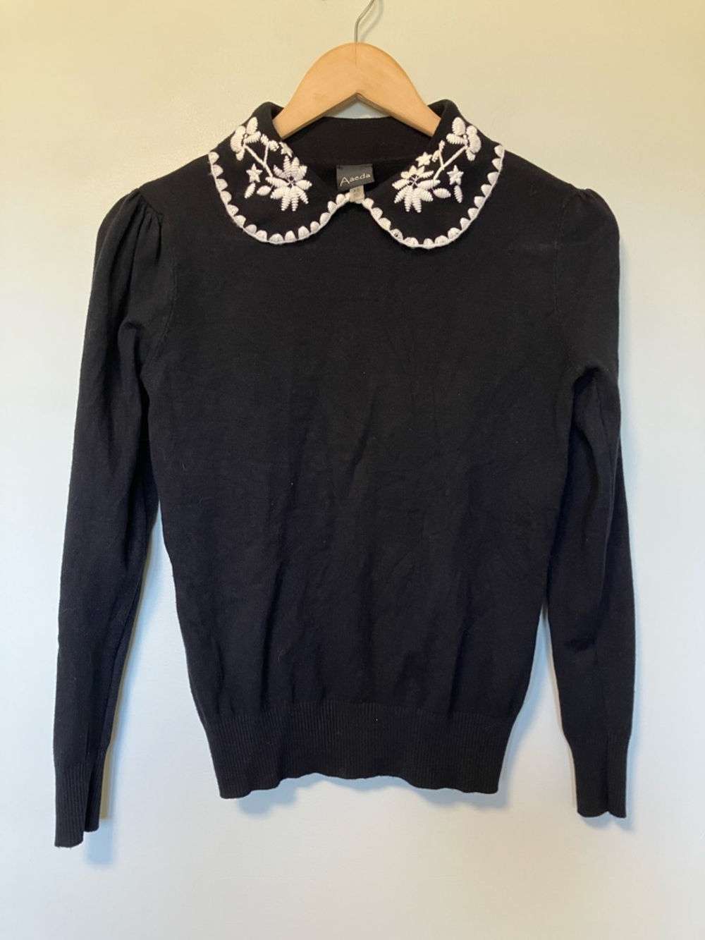 Aaeda Black Sweater with White Embroidered Collar